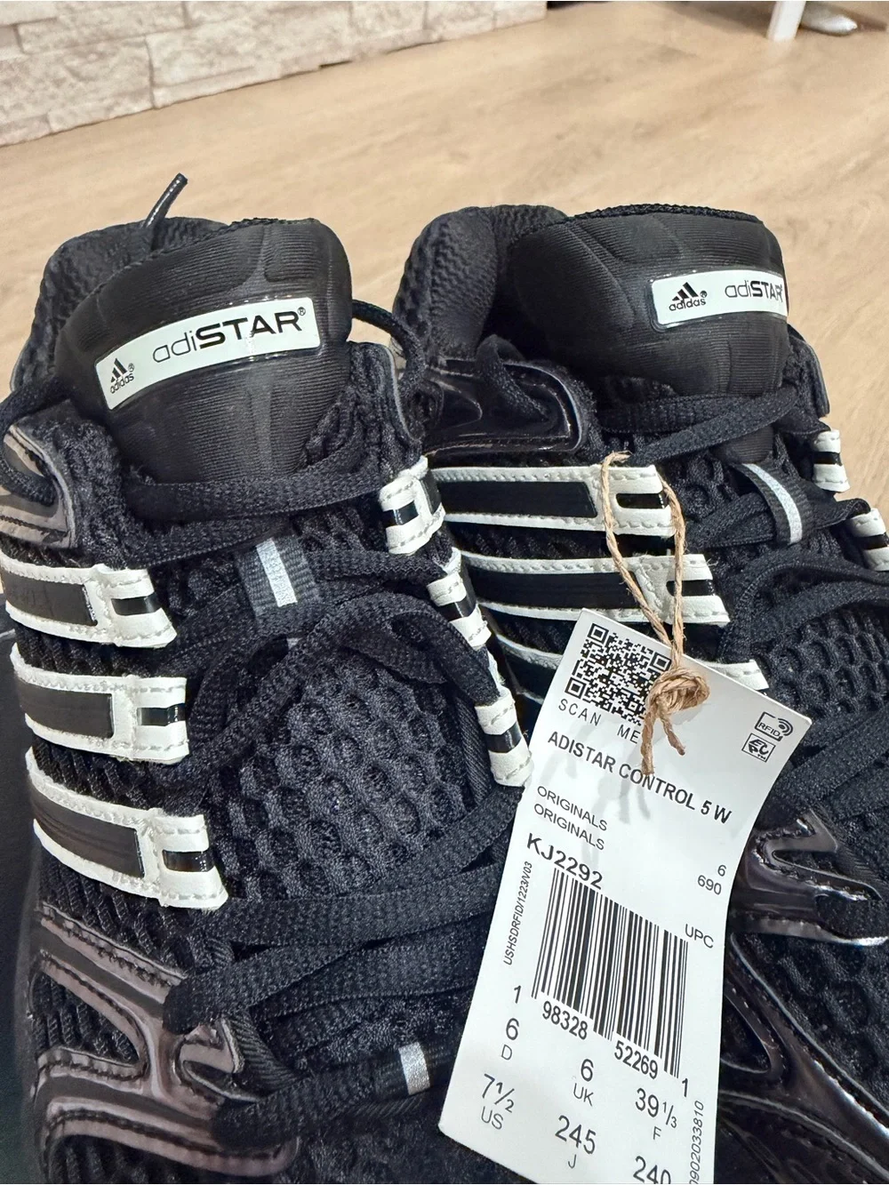 adidas Black Sneakers with White Stripe Accents